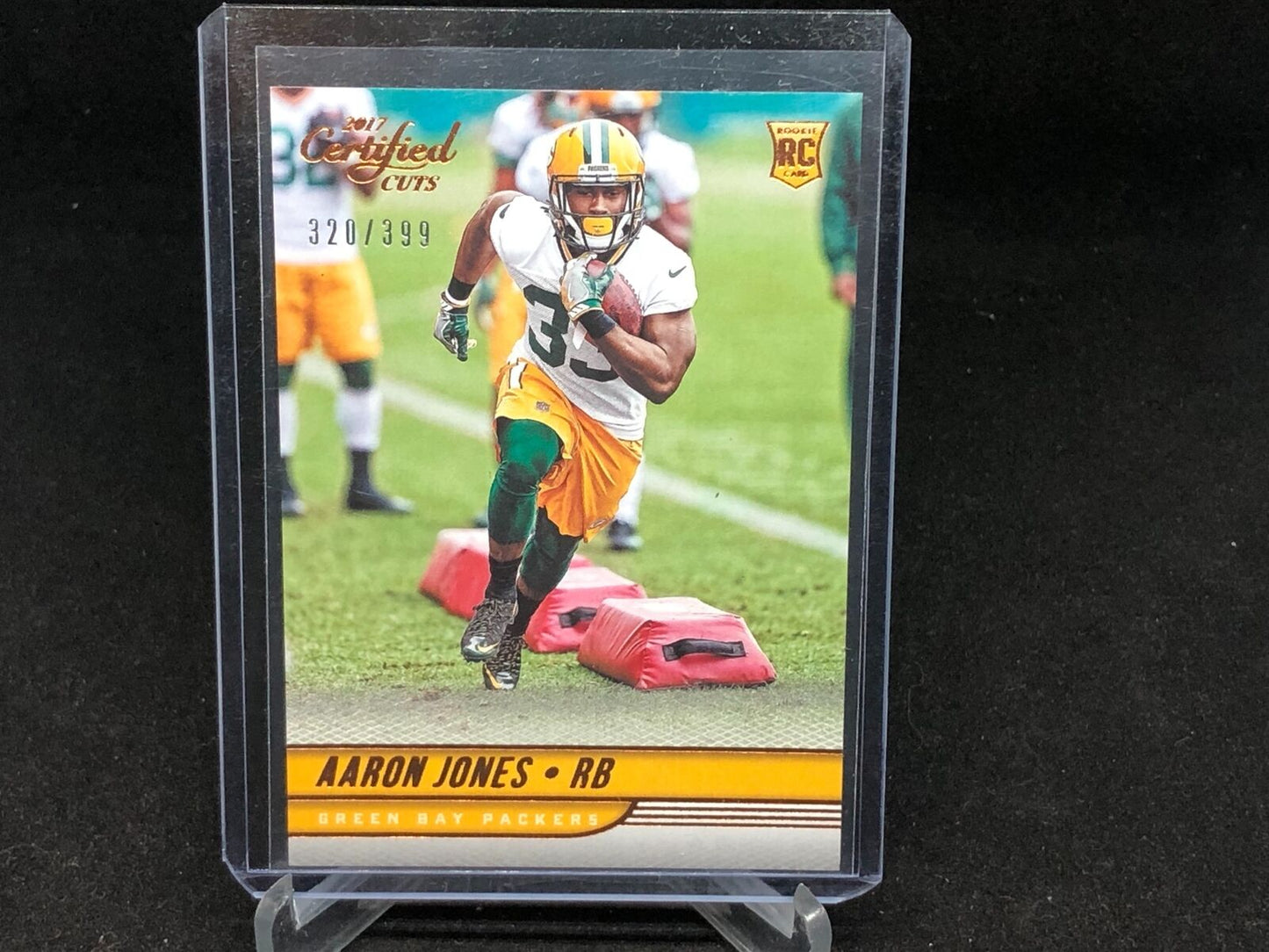 AARON JONES 2017 PANINI DONRUSS CERTIFIED CUTS RC #D 320/399