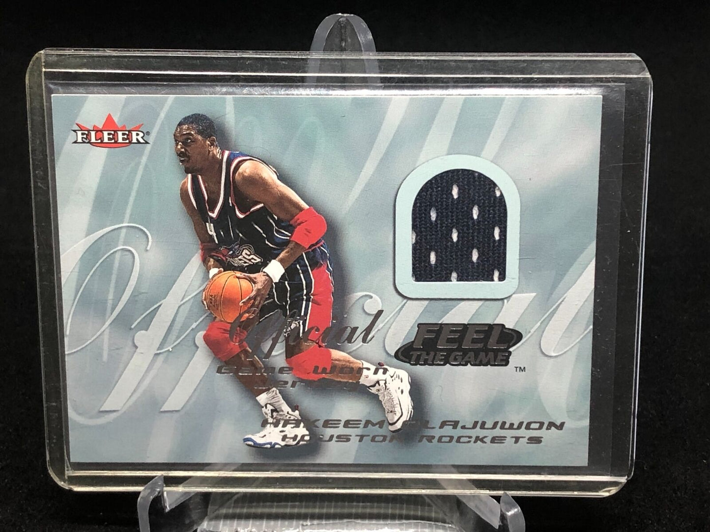 HAKEEM OLAJUWON 2000-01 FLEER SKYBOX FEEL THE GAME JERSEY GAME WORN RELIC