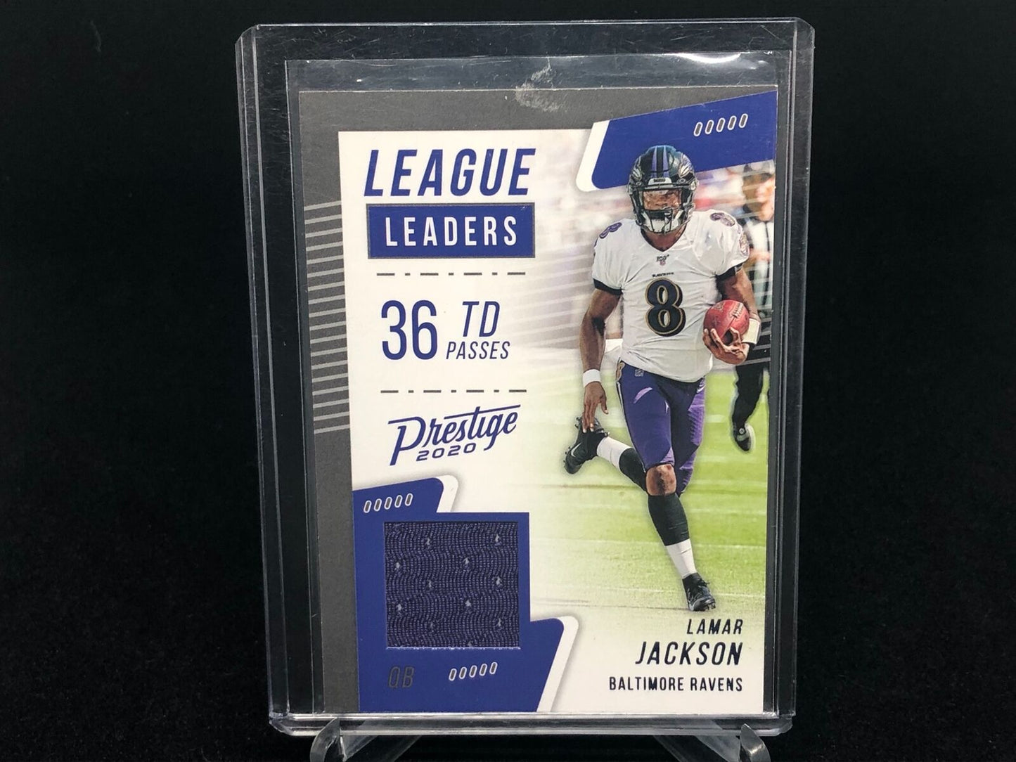 LAMAR JACKSON 2020 PRESTIGE PURPLE LEAGUE LEADERS JERSEY RELIC