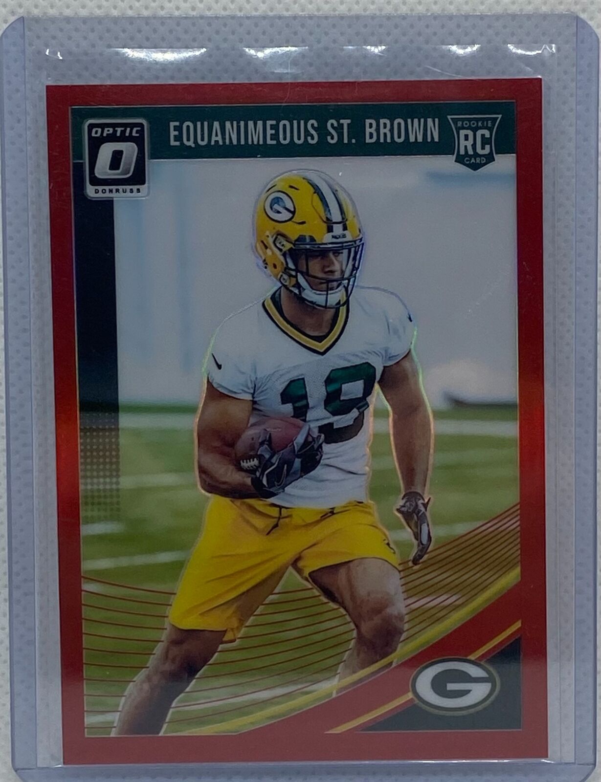 EQUANIMEOUS ST. BROWN 2018 PANINI DONRUSS OPTIC RED HOLO PRIZM RC #D 13/99