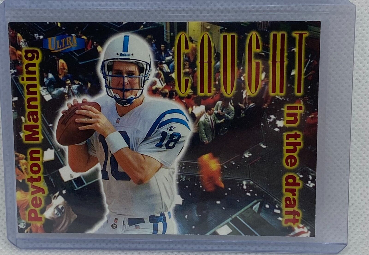 PEYTON MANNING 1998 FLEER CAUGHT IN THE DRAFT ROOKIE RC #4
