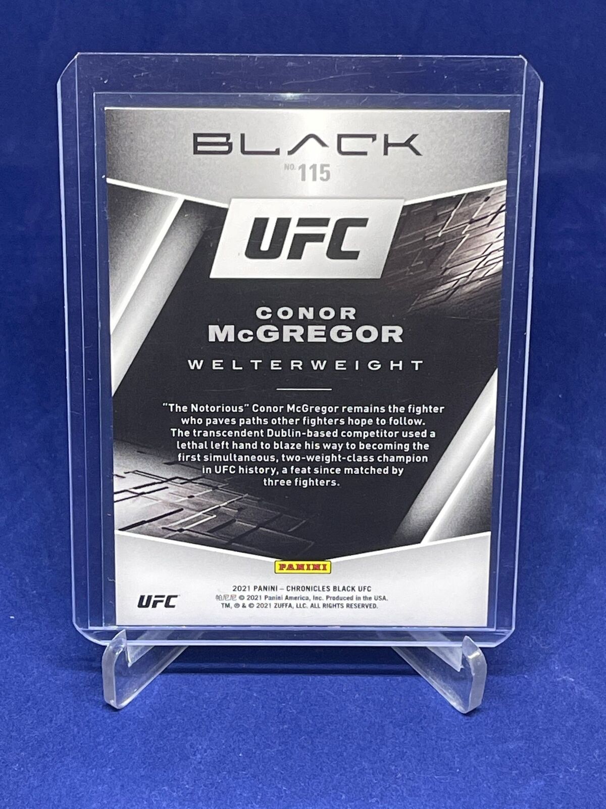 CONOR MCGREGOR 2021 PANINI CHRONICLES BLACK RED #D 44/149