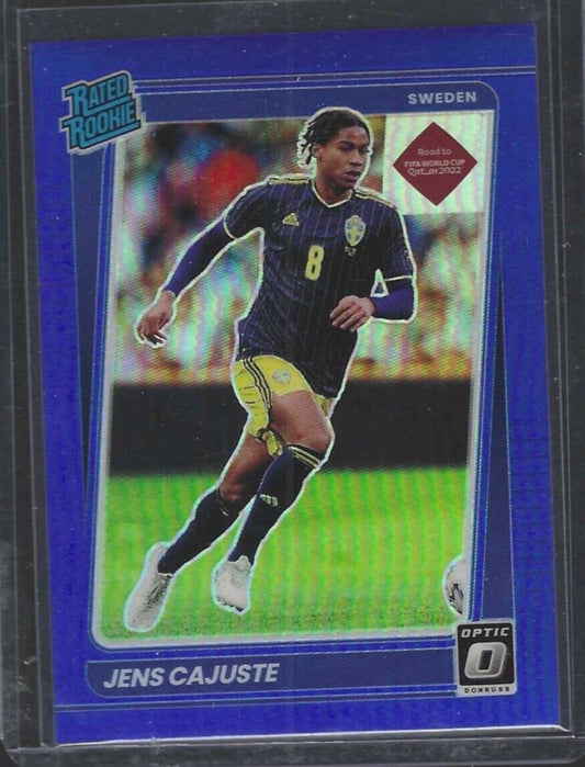 JENS CAJUSTE 2021-22 DONRUSS ROAD QATAR OPTIC BLUE HOLO RATED ROOKIE RC #D 29/99