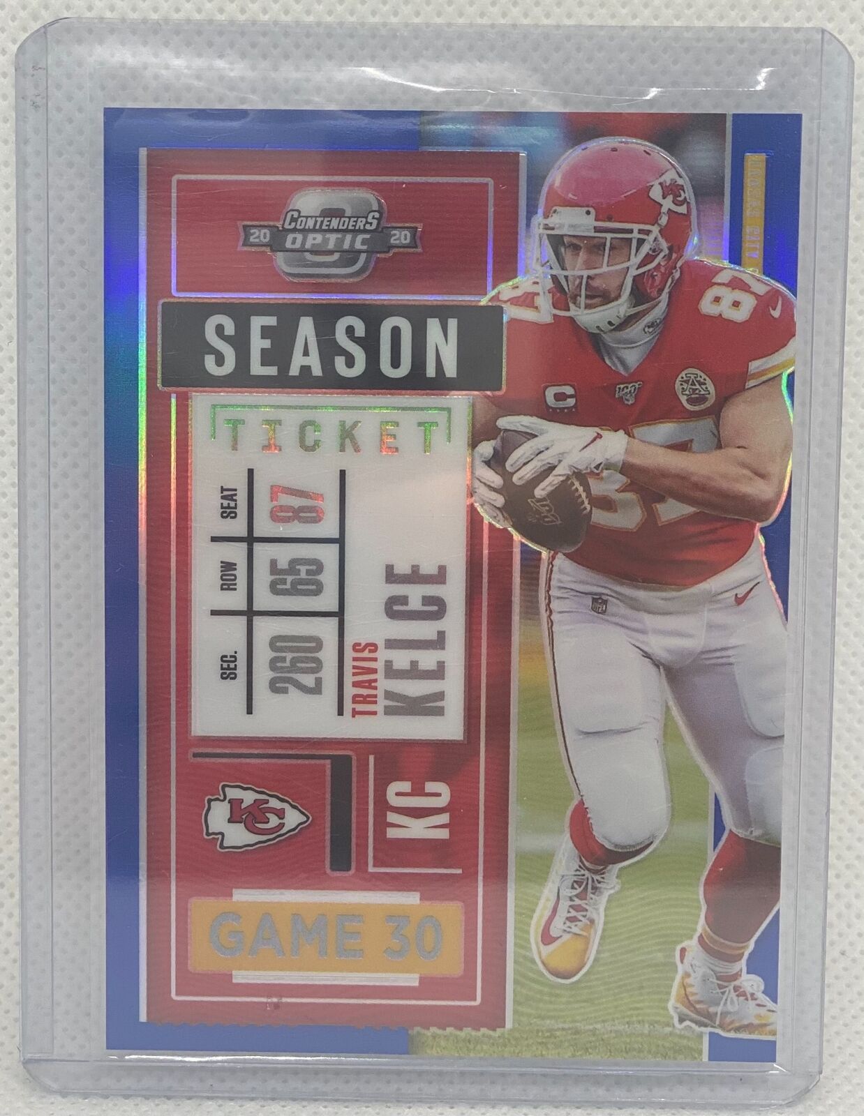 TRAVIS KELCE 2020 PANINI CONTENDERS OPTIC SEASON TICKET BLUE HOLO PRIZM #D 49/99