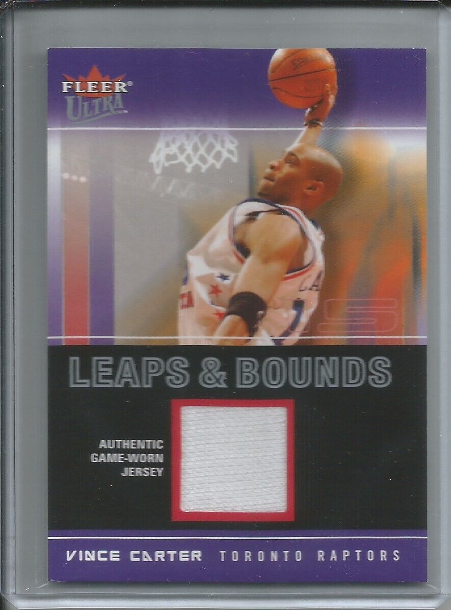 VINCE CARTER 2003-04 FLEER ULTRA LEAPS & BOUNDS GAME WORN JERSEY RELIC