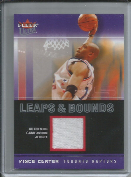 VINCE CARTER 2003-04 FLEER ULTRA LEAPS & BOUNDS GAME WORN JERSEY RELIC