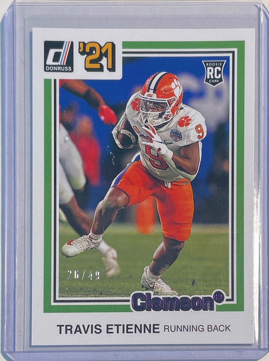 TRAVIS ETIENNE 2021 CHRONICLES DONRUSS DRAFT PICKS '21 PURPLE ROOKIE RC #D 26/49