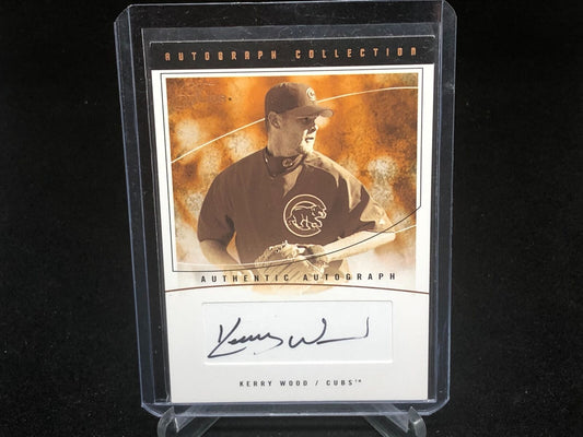 KERRY WOOD 2004 FLEER FLAIR ON CARD AUTO #D 65/73