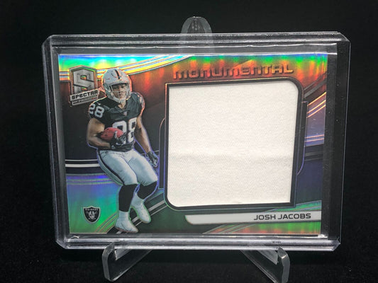 JOSH JACOBS 2019 SPECTRA MONUMENTAL PRIZM JERSEY RELIC RC #D 144/199
