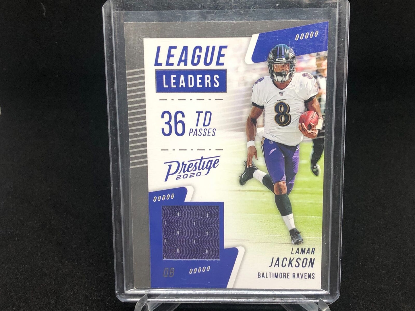 LAMAR JACKSON 2020 PRESTIGE PURPLE LEAGUE LEADERS JERSEY RELIC