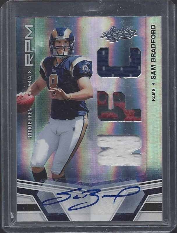 SAM BRADFORD 2010 ABSOLUTE RPM SILVER SPECTRUM TRIPLE JERSEY AUTO RC #D 25/25