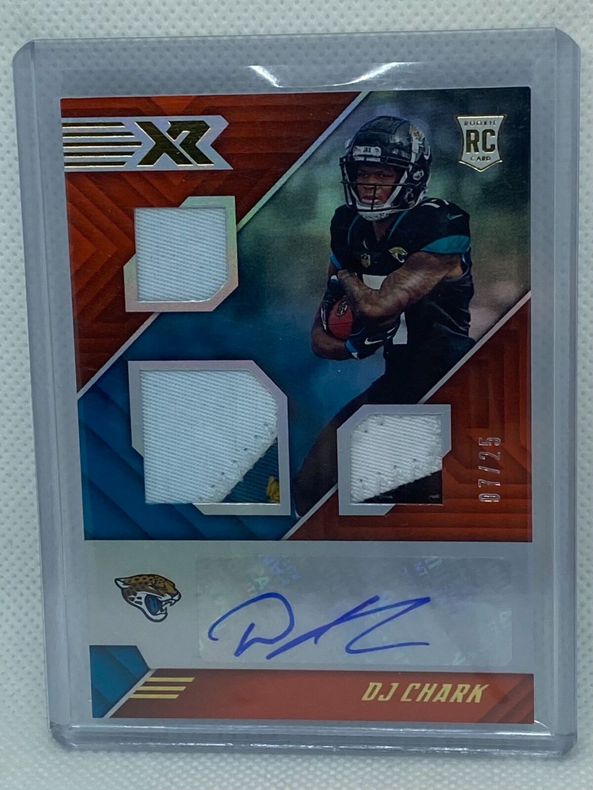 DJ CHARK 2018 PANINI XR ORANGE TRIPLE PATCH AUTO RC #D 7/25