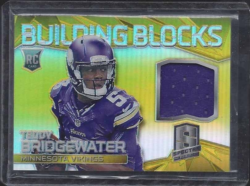 TEDDY BRIDGEWATER 2014 SPECTRA BUILDING BLOCKS GOLD PRIZM JERSEY RC #D 19/25
